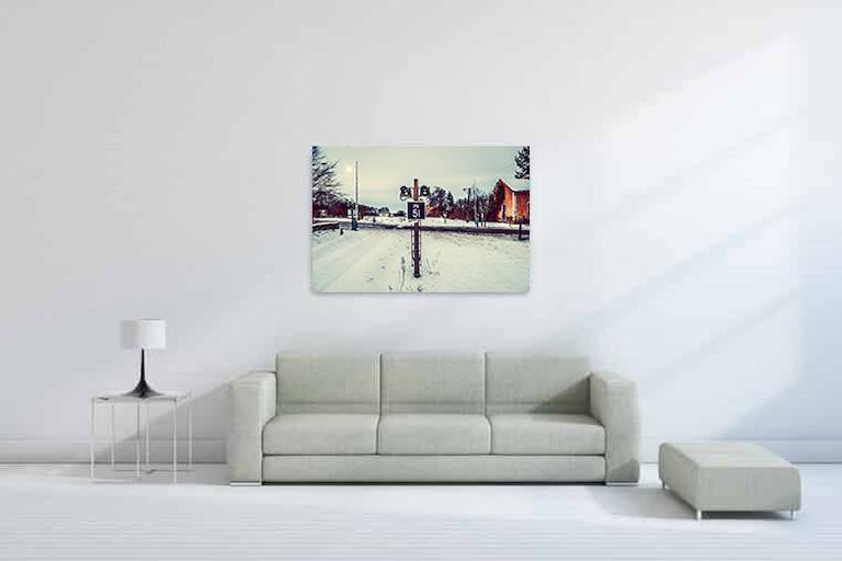 Framed print shown above sofa, size 40 × 30 inches (101.6 × 76.2 cm)
